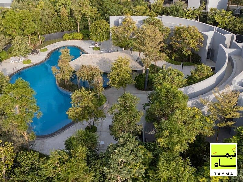 14 14 - Villa A - Central Lagoon Pool Aerial 02 - 14. jpg