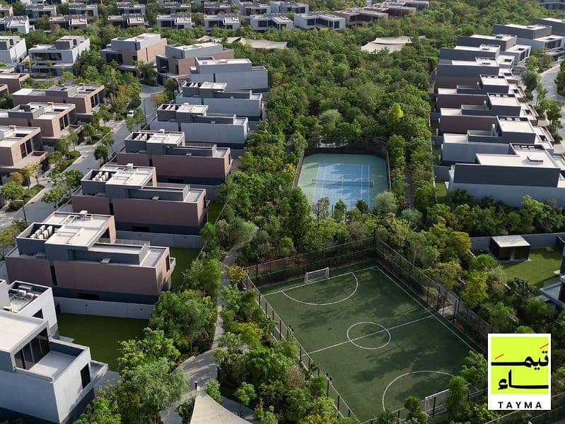 19 19 - Villa A - Community Green Spine Aerial 02 - 19. jpg