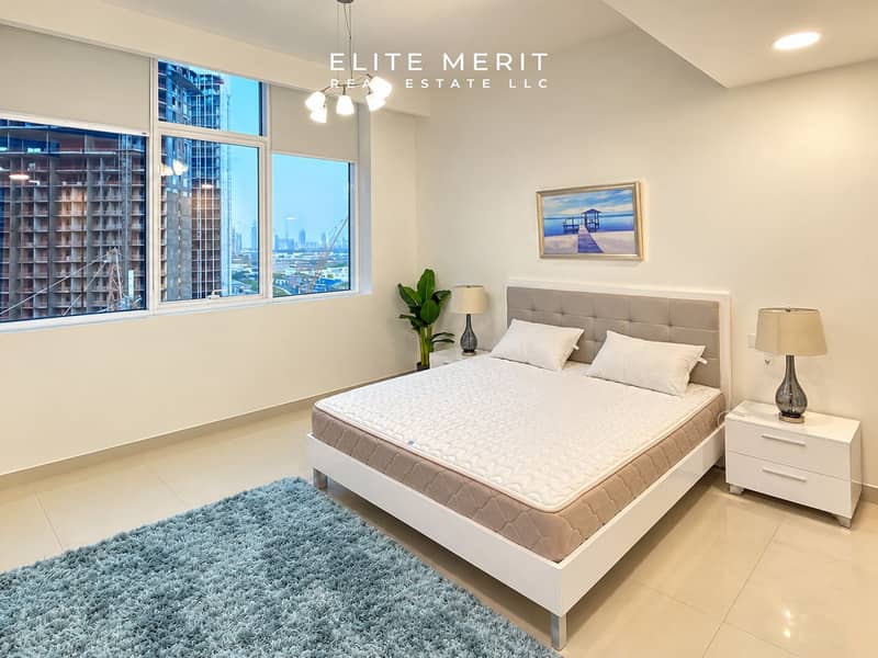 4 Bright Modern Bedroom with Urban Views. png