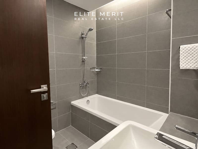 7 Modern Minimalist Gray Tile Bathroom. png