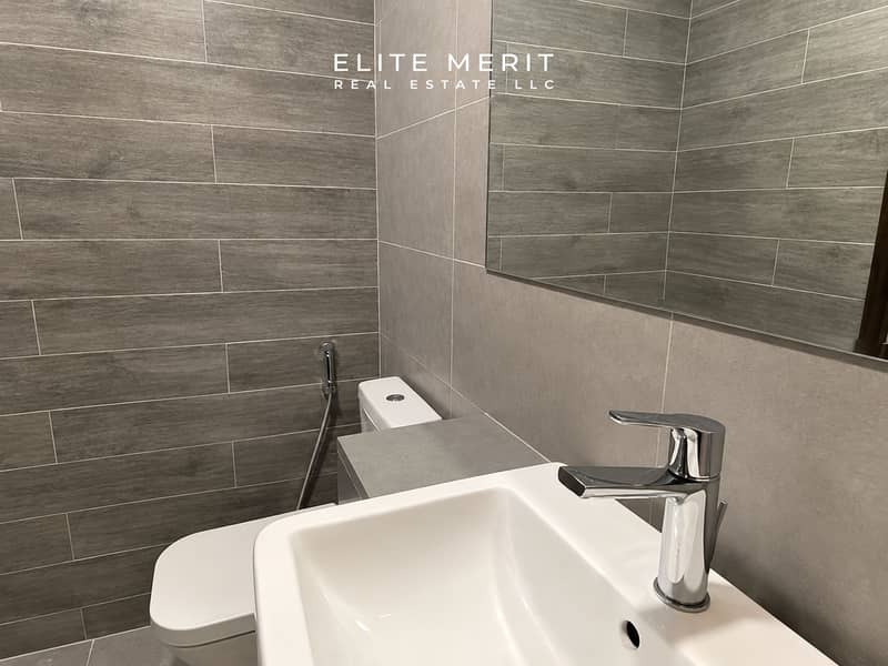 8 Modern Gray-Tiled Bathroom Vanity. png