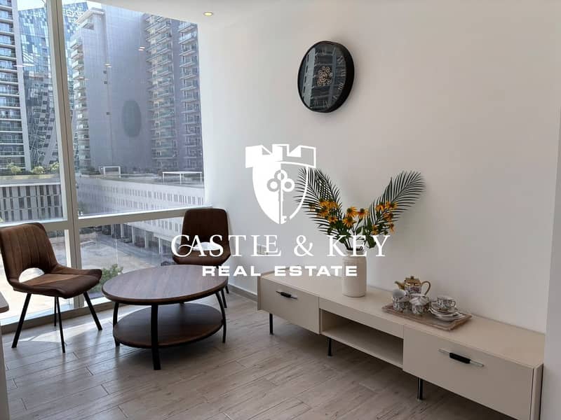 4 office Tamani Arts 557 small round coffee table. jpeg