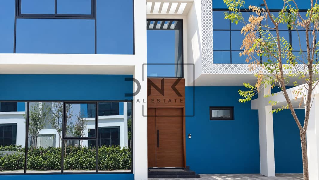 9 Modern Blue-and-White Townhouse Facade. png
