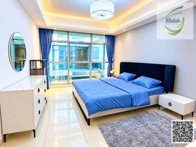 3 habitaciones Apartamento para en Venta en Al Rashidiya, Ajman - Modern Blue Bedroom with Glass Views (1). png