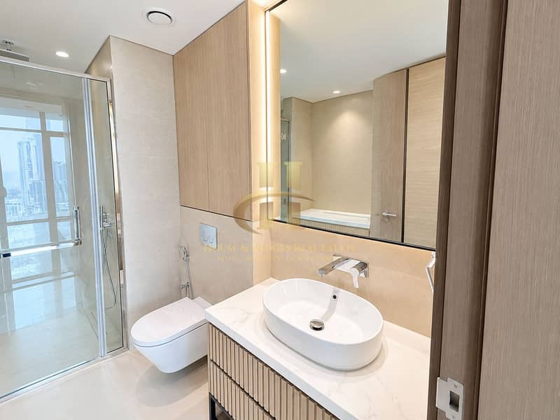 15 Modern Beige Bathroom with City Views. png