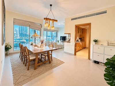 3 Schlafzimmer Wohnung zum Miete in Dubai Marina, Dubai - Modern Marina-View Dining and Living Space 3 Schlafzimmer Wohnung zum Miete in Dubai Marina, Dubai - Modern Marina-View Dining and Living Space