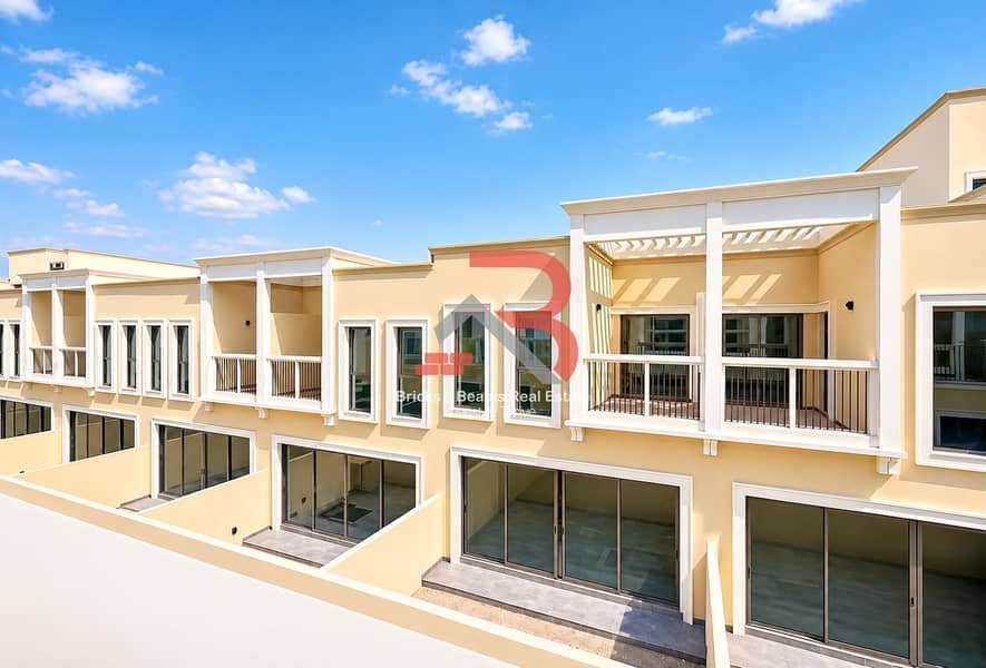 Modern Beige Townhouses Under Blue Skies. png Modern Beige Townhouses Under Blue Skies. png