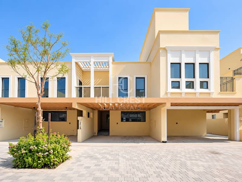 2 Modern Townhouse Under Blue Skies. png
