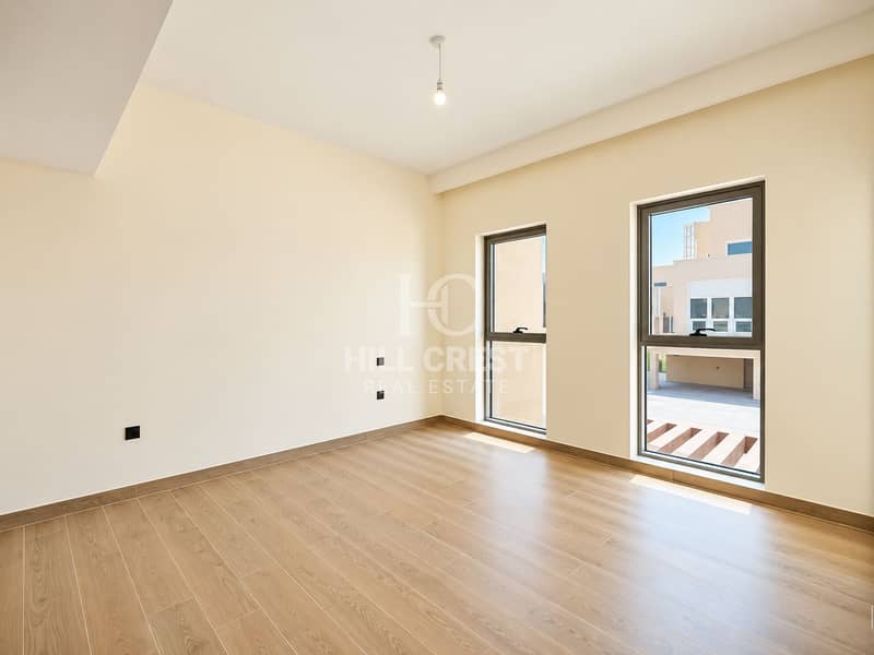 9 Bright Minimalist Room with Sunlit Windows. png