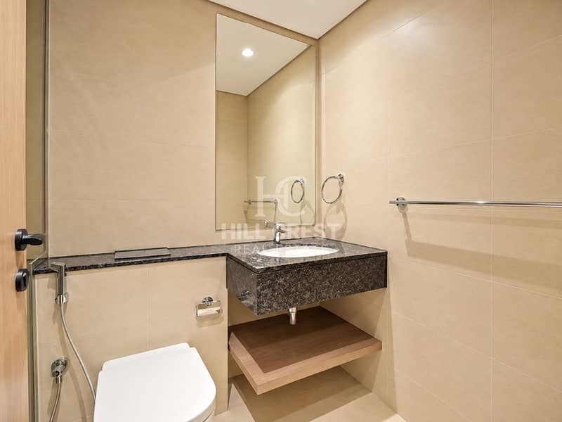 18 Warm Minimalist Modern Bathroom. png