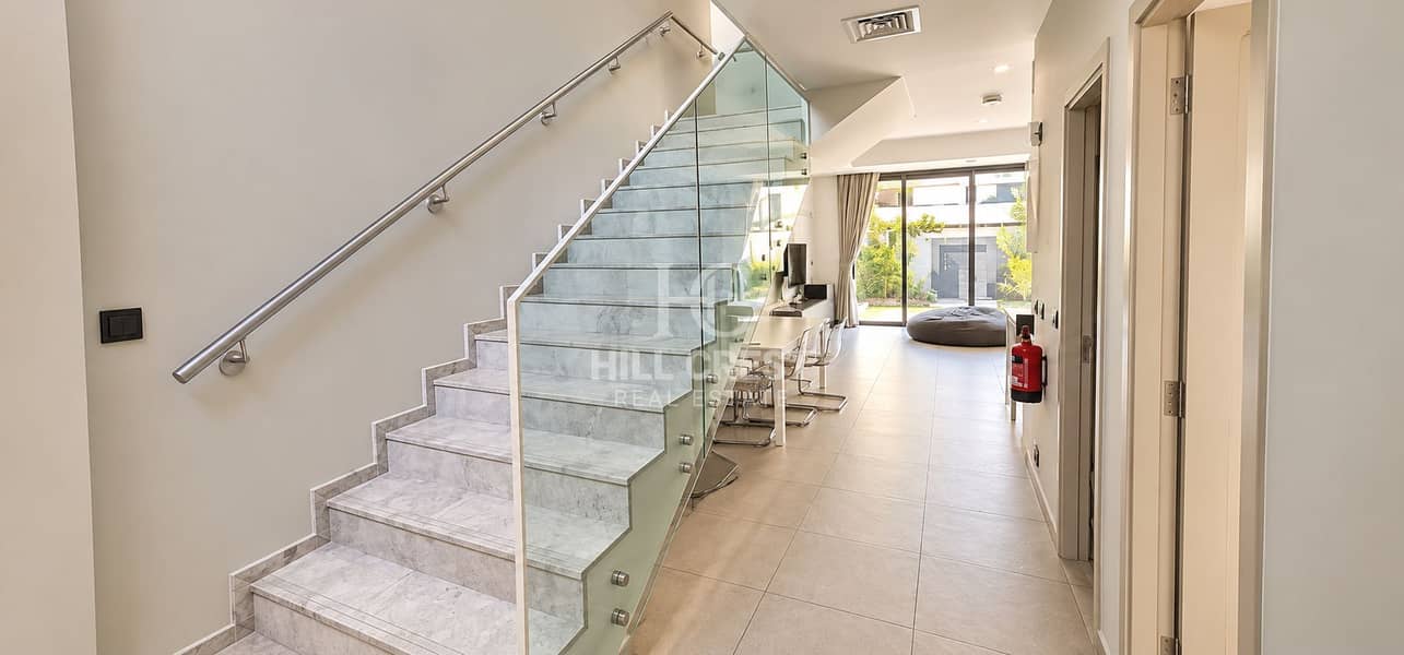 6 Modern Hallway with Marble Staircase. png
