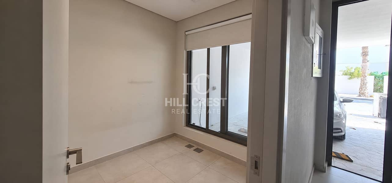 13 Minimal Room with Window and Driveway. png