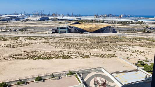 2 Bedroom Flat for Rent in Wasl Gate, Dubai - Desert Arena and Port Skyline. png