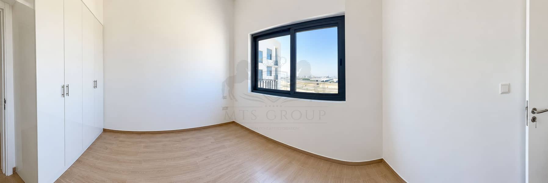 2 Bright Minimalist Room with Desert View. png