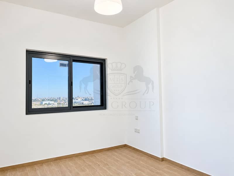 3 Bright Minimalist Room with City View. png