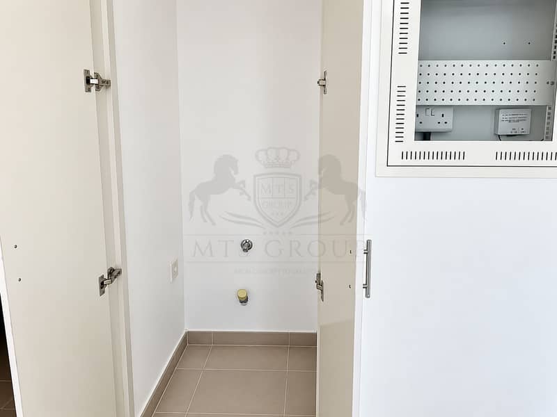 11 Minimalist Utility Alcove with Open Cabinets. png