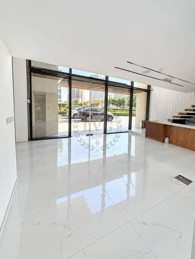 Shop in affitto a Sobha Hartland, Dubai - Modern Marble Storefront Interior. png Shop in affitto a Sobha Hartland, Dubai - Modern Marble Storefront Interior. png