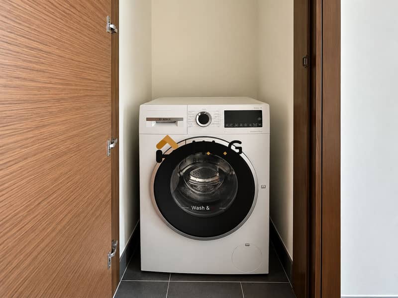 14 Minimal Laundry Alcove with Bosch Washer. png