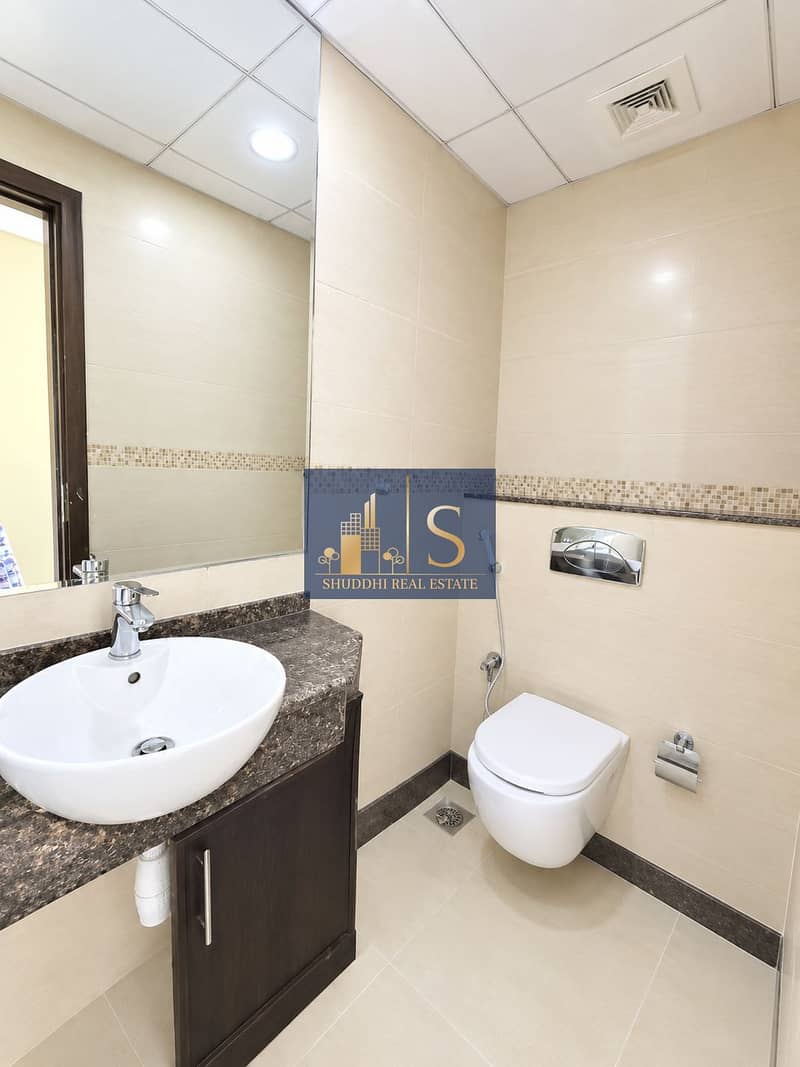 5 Bright Modern Beige Tile Bathroom. png