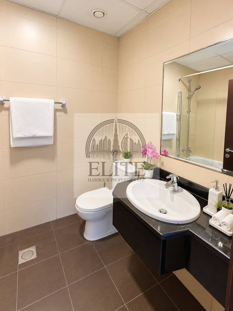 10 Modern hotel bathroom with orchids-3. png