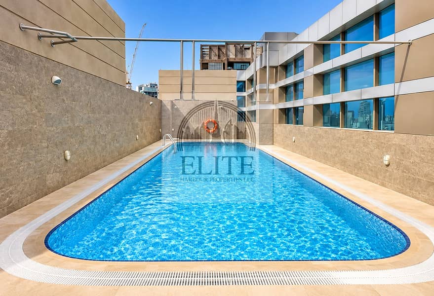 15 Crisp Rooftop Pool and City Views. png