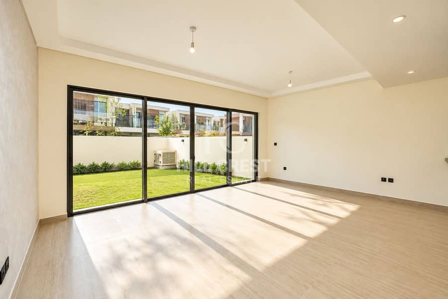 Sunlit Minimalist Room with Garden Views. png Sunlit Minimalist Room with Garden Views. png