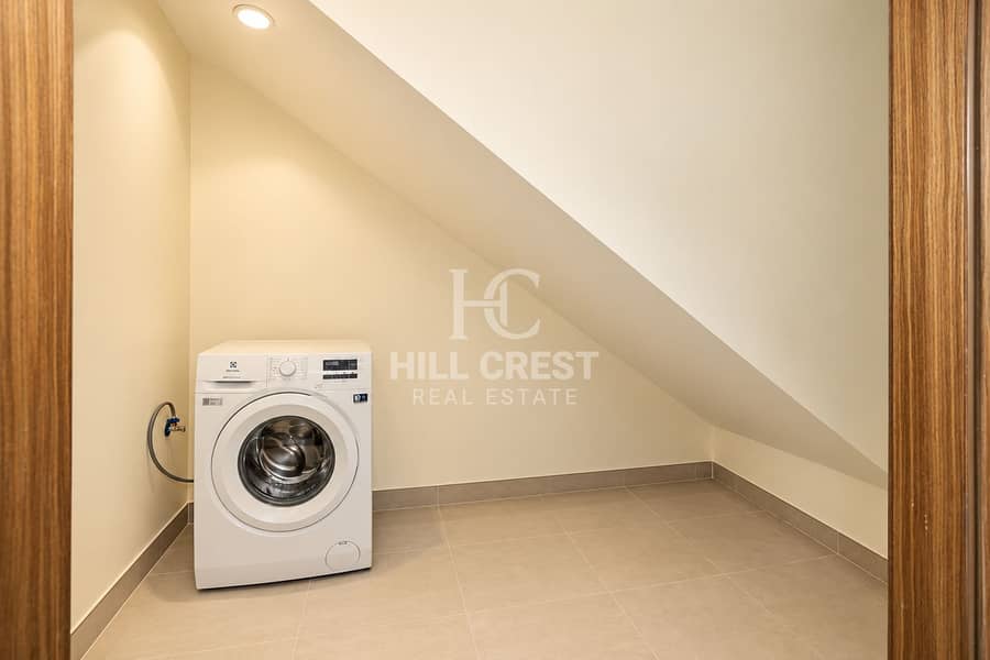 8 Minimal Under-Stair Laundry Nook. png