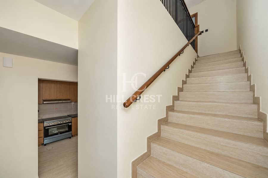 9 Modern Stairwell and Kitchen Entry. png