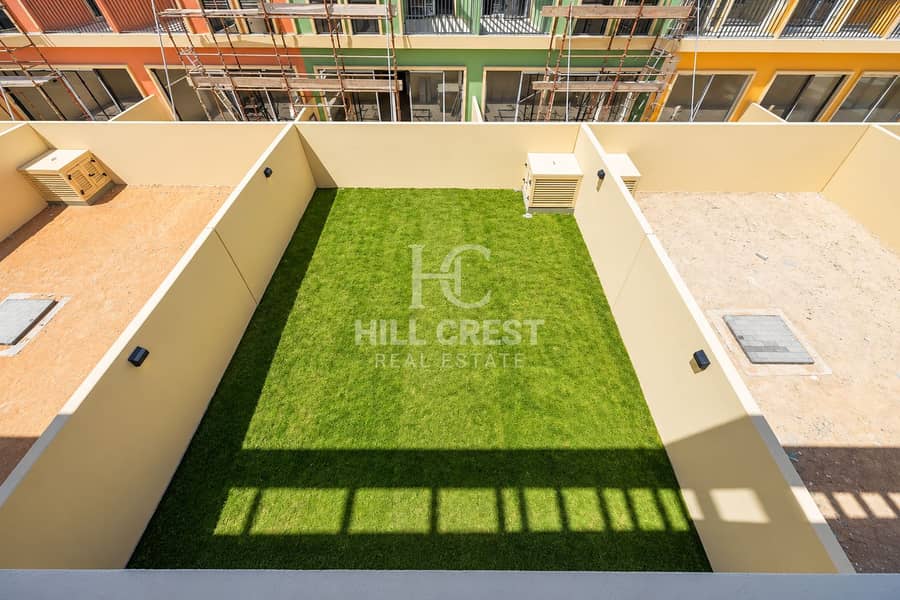 20 Sunlit Modern Courtyard with Scaffolding. png