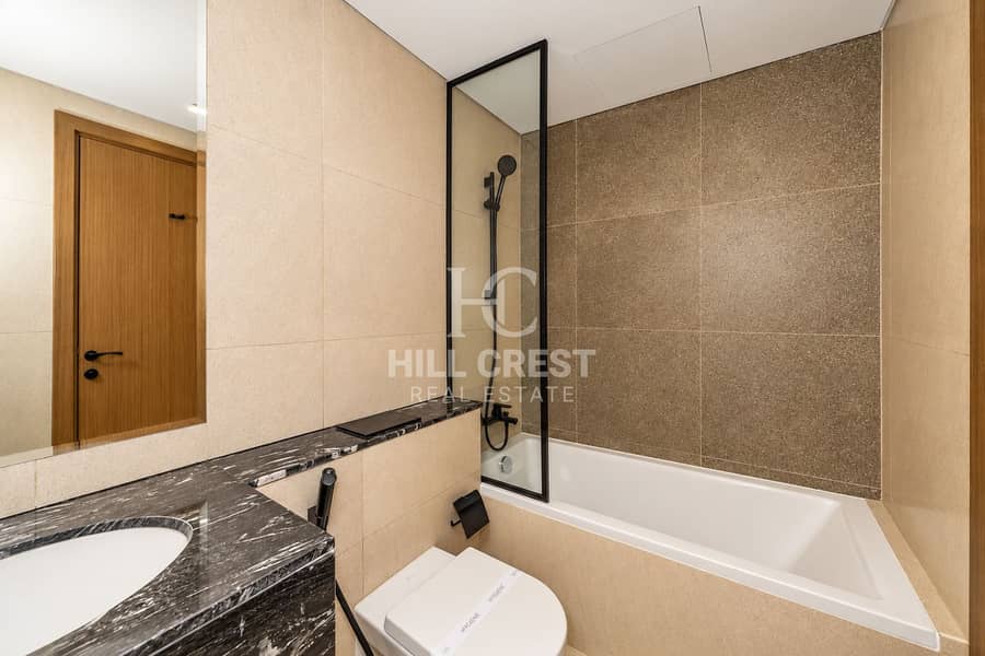 21 Modern Beige Bathroom with Black Fixtures. png
