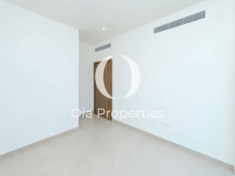 8 Minimalist Empty Room with Wooden Door. png