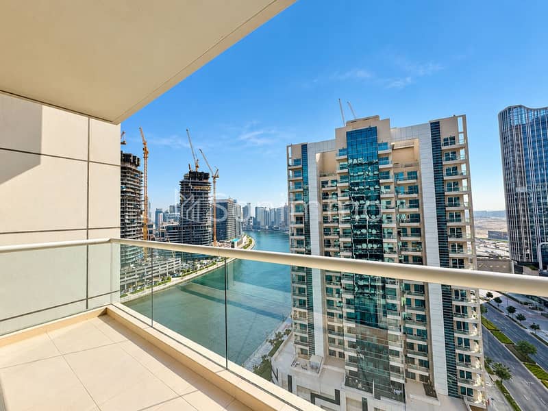 4 Sunny Marina Skyline from a Modern Balcony. png