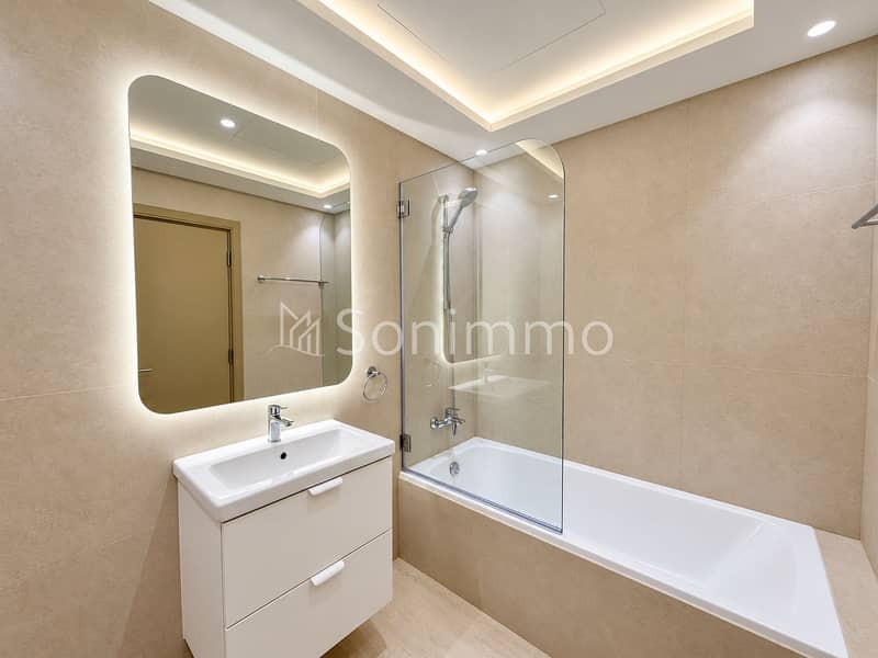7 Bright Minimalist Beige Bathroom. png