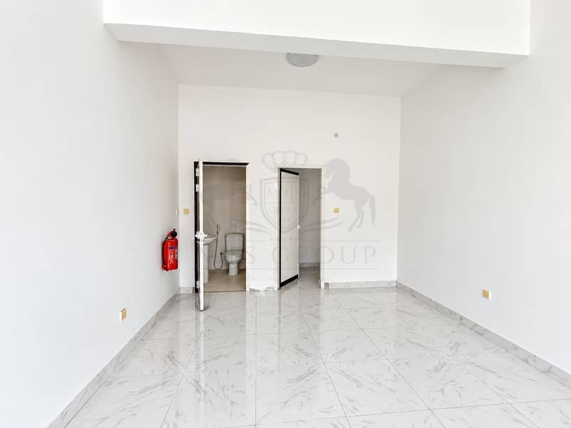 2 Modern Empty Retail Space with Restroom. png