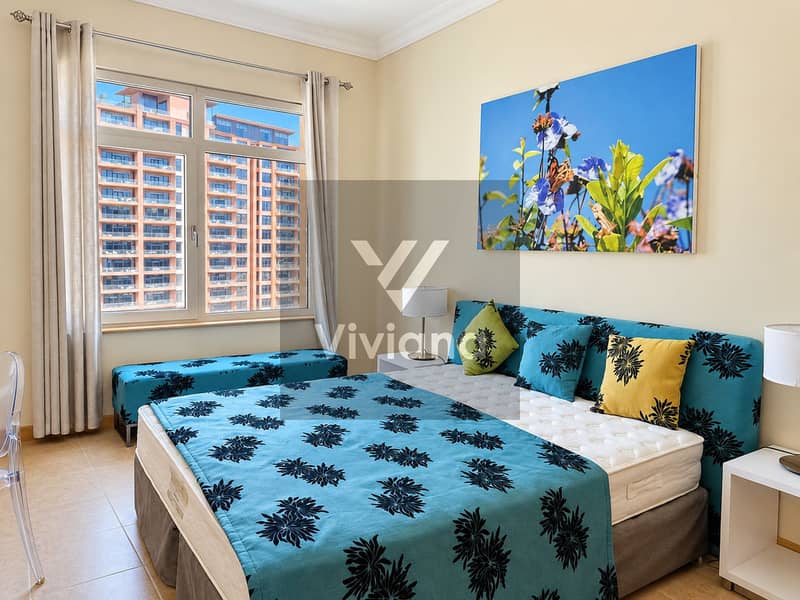 2 Bright Teal Floral Bedroom with City View. png