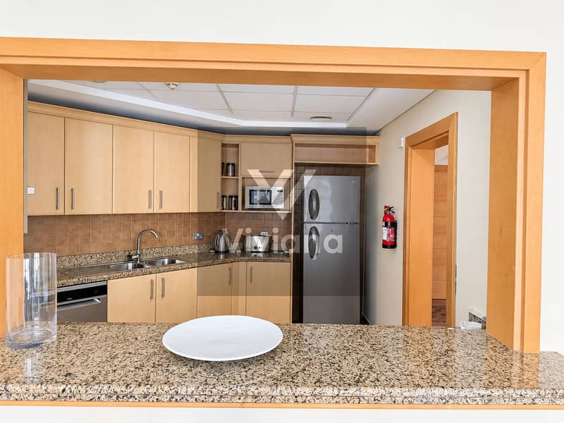 3 Modern Maple Kitchen Through Serving Hatch. png
