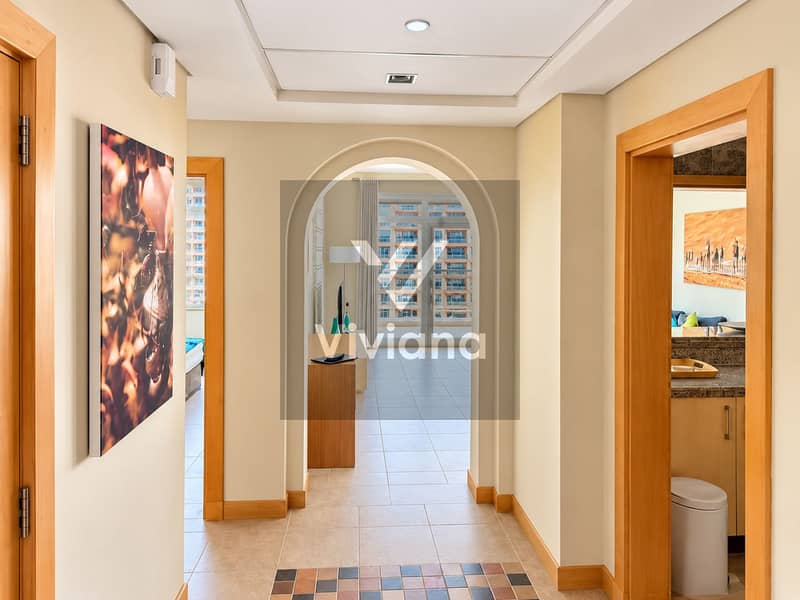 12 Sunlit Arched Apartment Hallway. png