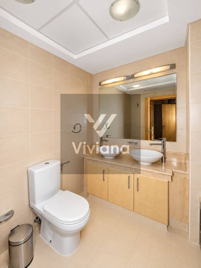 16 Modern Beige Bathroom with Double Vanity. png
