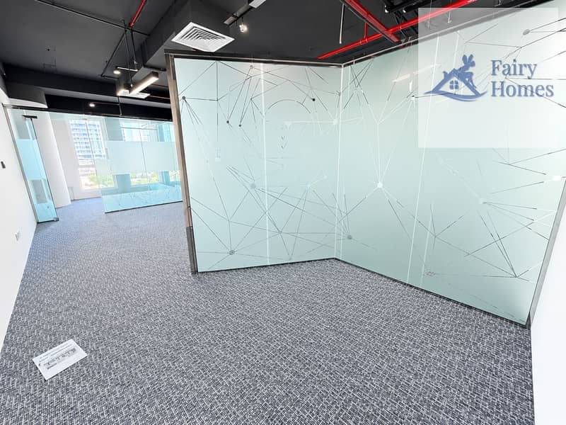 5 Modern Open-Plan Office with Geometric Glass Partitions. png