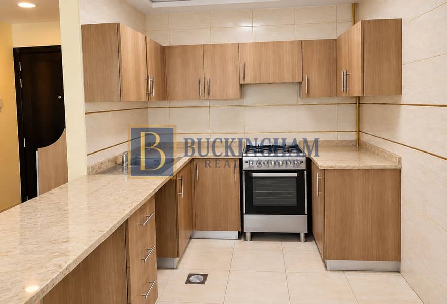 7 Minimalist Cream Marble U-Shaped Kitchen. png