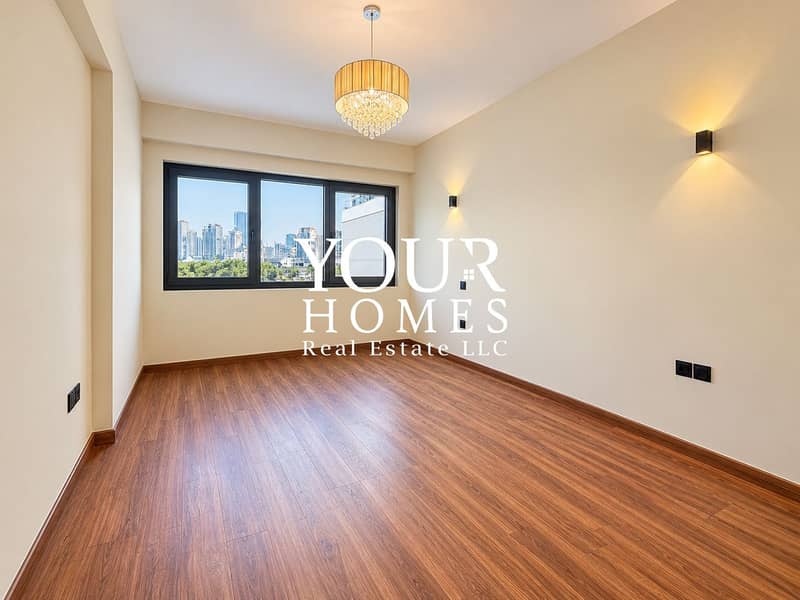 6 Warmly Lit Minimalist Room with City Window-1. png