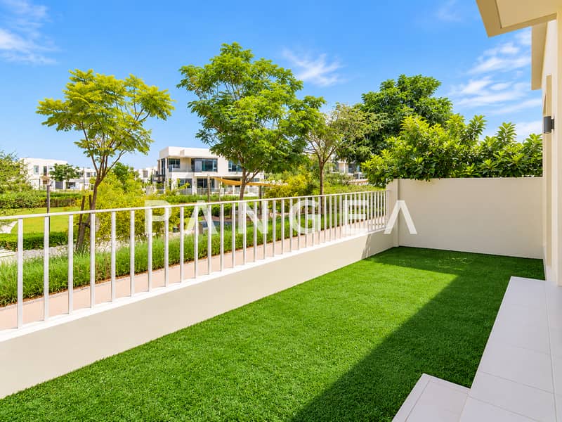 16 Modern_Green_Courtyard_with_White_Railings. png
