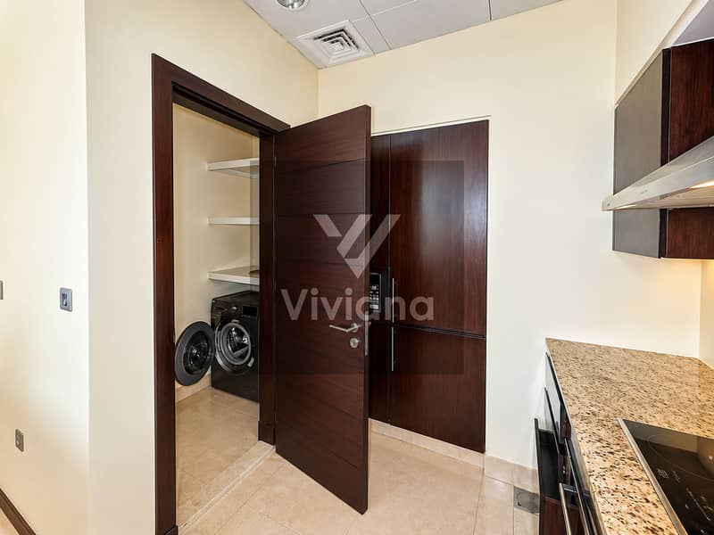 4 Modern Kitchen with Hidden Laundry Nook. png