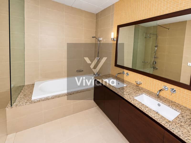 8 Contemporary Beige Bathroom with Double Vanity. png