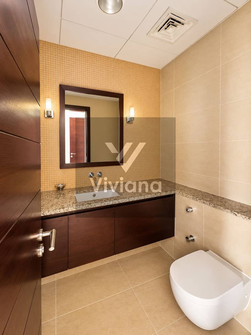 9 Elegant Beige Mosaic Bathroom. png