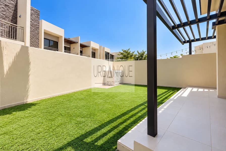 2 Sunlit Modern Courtyard with Pergola Shadows. png