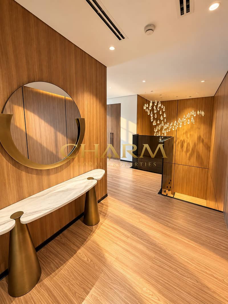 17 Luxe Wood Foyer with Crystal Chandelier. png