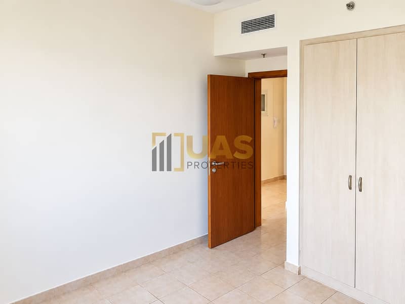5 Bright airy bedroom with open door. png