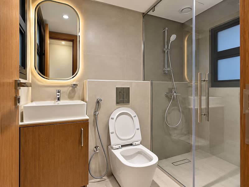 9 Modern Beige Bathroom with Warm Wood Accents. png