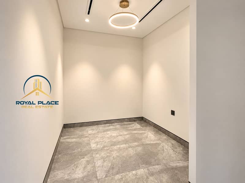 5 Minimalist Room with Glowing Ring Light. png